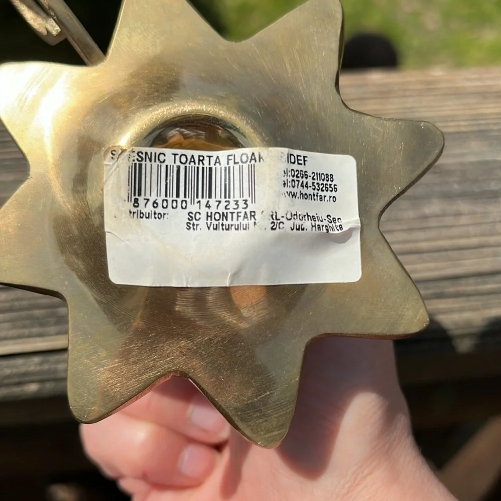 Brass candle holder.